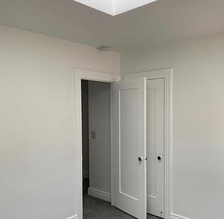 Bedroom with skylight