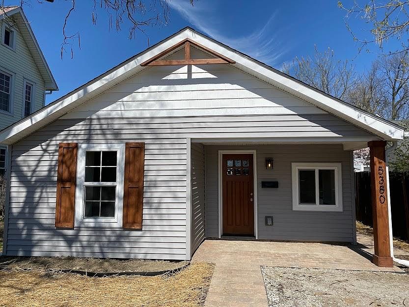 Front of the home, including paver front porch.