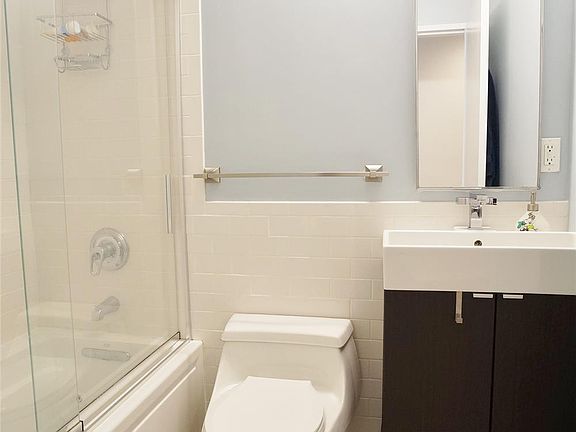 5th image of 239 E 10th St APT 1A