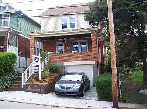 Exterior Front: GREAT PORCH..NEWER DRIVEWAY