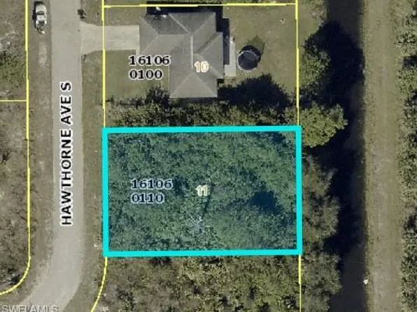 669 Hawthorne AVE S, LEHIGH ACRES, FL 33974