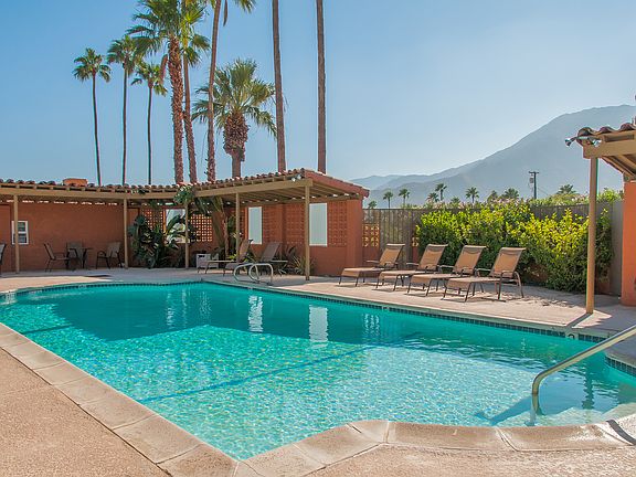 Large pool with cabana and beautiful mountain views