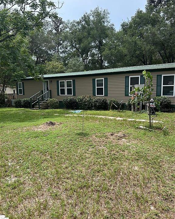 1st image of 570 NE 70th Ter