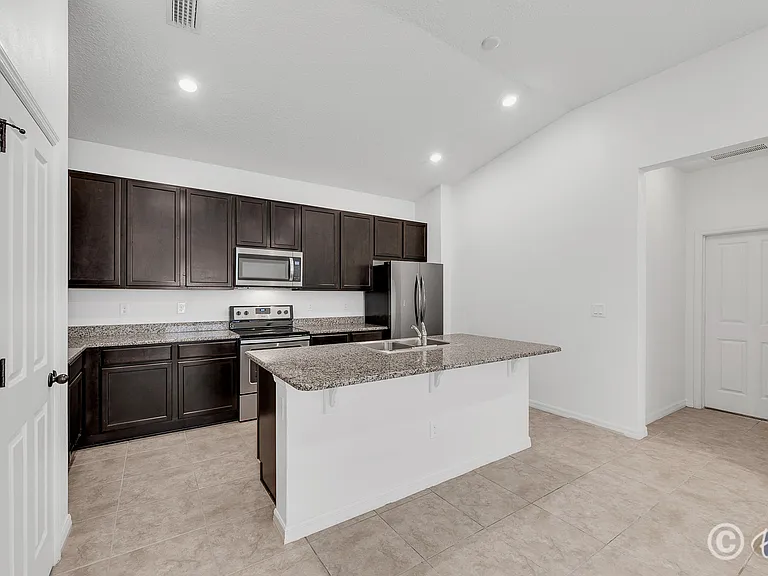 7608 Sunshine Bridge Ave — Photo 4