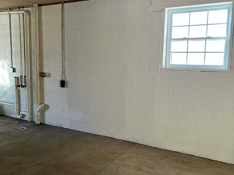 Wide space garage, plenty of room for vehicles and or storage