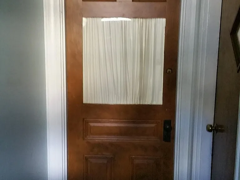 Front door closed - shared front door area.