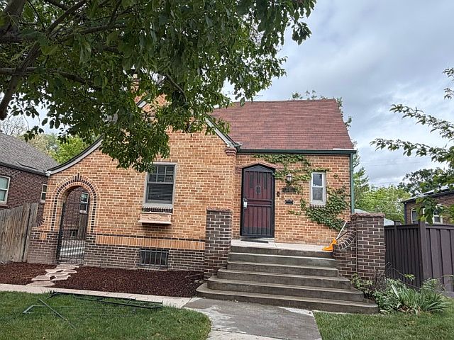 Front of house with new landscaping.