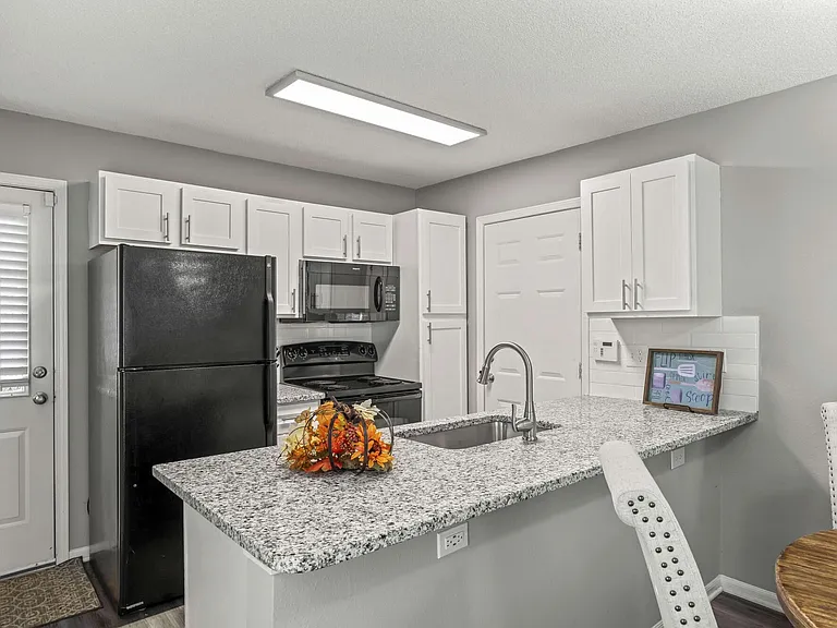 The Louis Townhomes — Photo 29