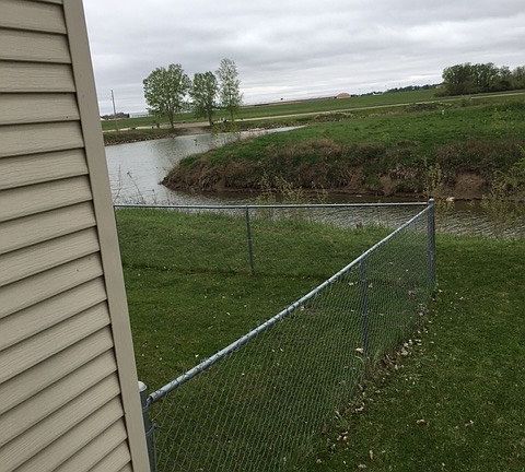 Fenced in yard, you are located on the water!