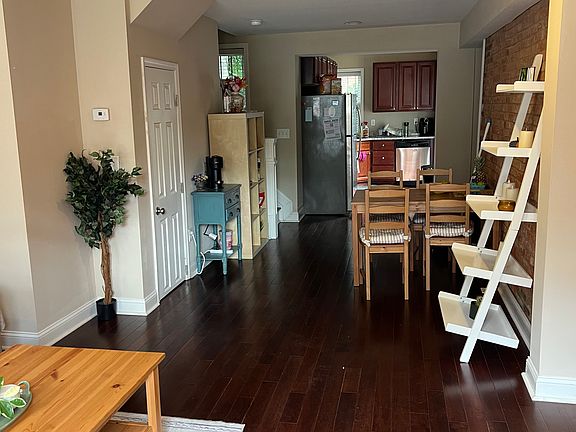 Common area leading to the kitchen in the rear