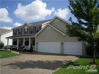 Lush lawn & landscape plus aggregate driveway