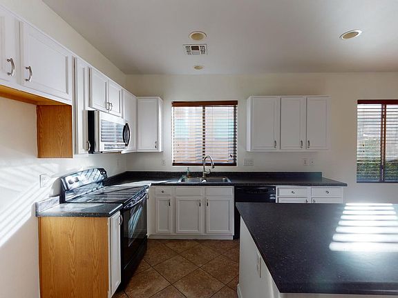 4th image of 10419 W Hughes Dr