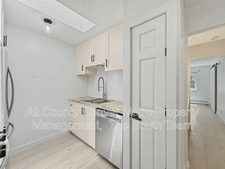 2835 S Monaco Pkwy #1-308 — Photo 6