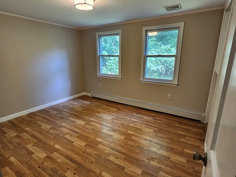 4th bedroom, located on 1st floor, back corner of home