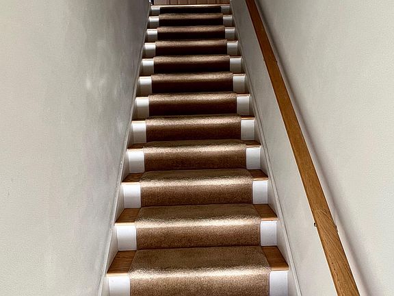 When you open the front door, you will have to go up a flight of stairs to the main level.