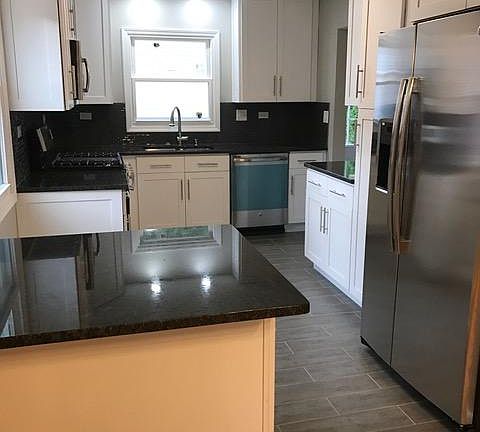 Stainless steel appliances, granite counter tops, pantry , eat at counter top
