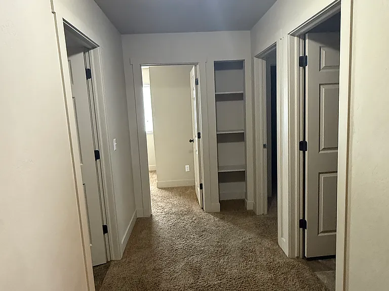 hall, looking in opposite direction from the laundry closet