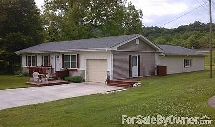 New Driveway and Siding
						:
						New Windows, New Roof!