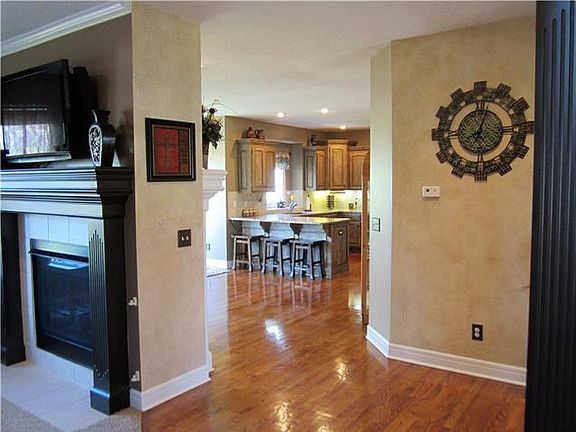 See-thru firelplace from Living to Hearth Room