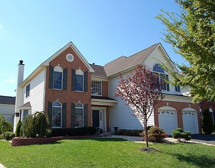 BRICK FRONT COLONIAL ON CORNER LOT