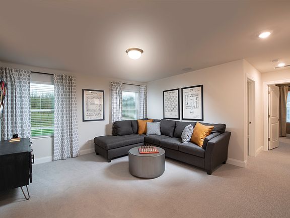 A large loft upstairs offers the perfect game or movie room.