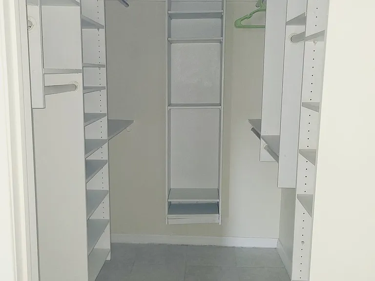 8 ft long walk in closet with full length mirror