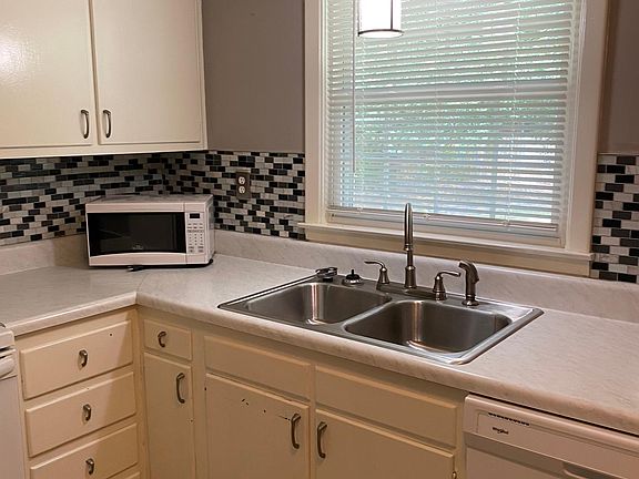 Kitchen with dishwasher.