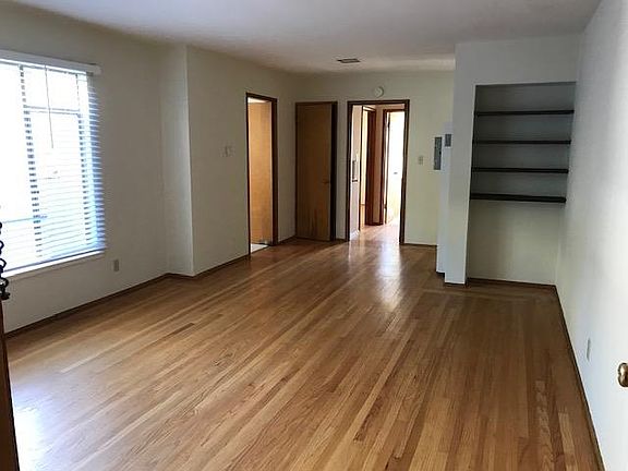 View of large living room / dining room combination from the front door