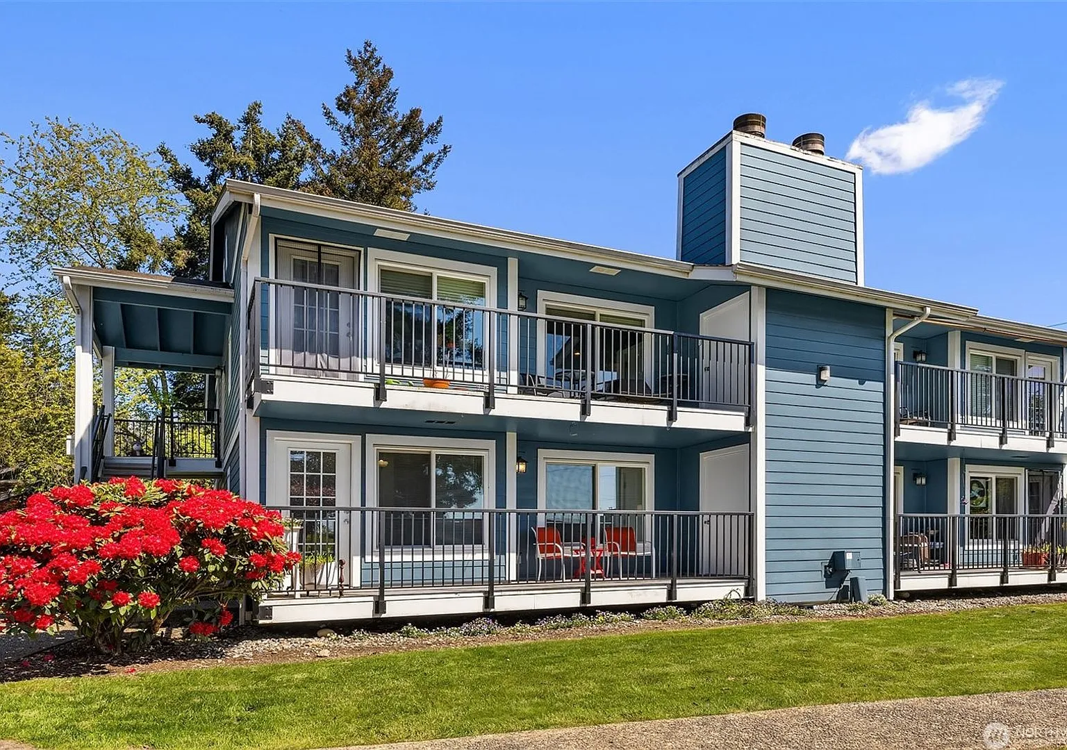 2 Bed 2 Bath Top-Floor Woodridge Condo with Sunset Views & 2-Car Garage — Photo 1