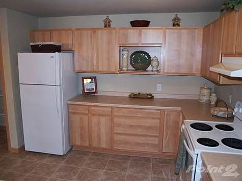 Kitchen Appiances Include Refrigerator, Oven Range Top, Hood