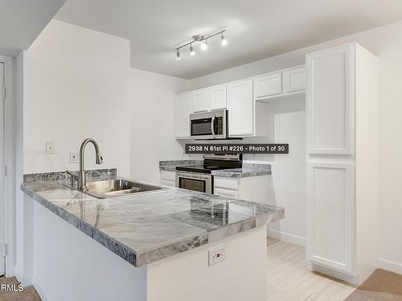 4th image of 2938 N 61st Pl Unit 226