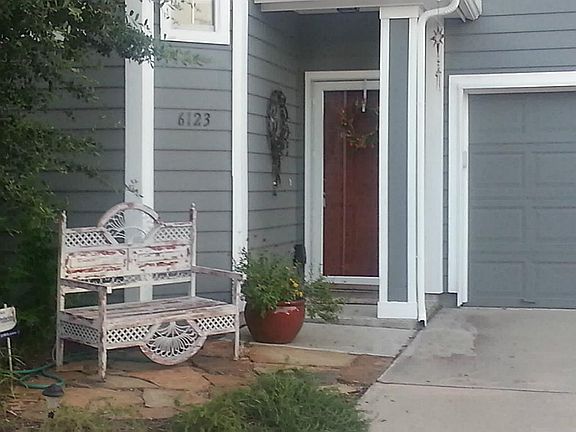 Lovely sitting area with freshly painted RED door.