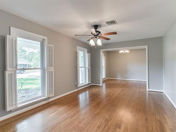 Formal living room immediately to the left as you walk through the front door.