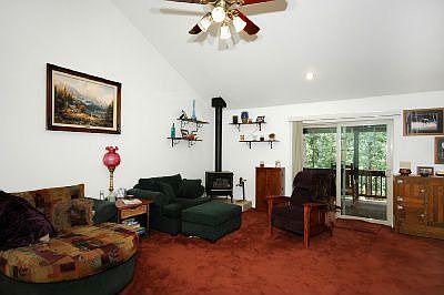 Large living room with vaulted ceilings.
