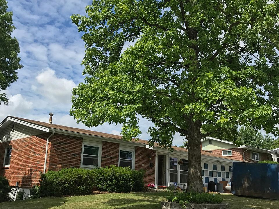 Situated on an extra large corner lot with large mature trees - Gumball tree. Side yard Maple tree. Lower back yard large 100 year old Oak tree. Sloping green front and side lawn