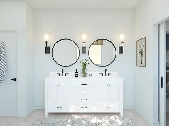 Primary bath with freestanding vanity and circular mirrors