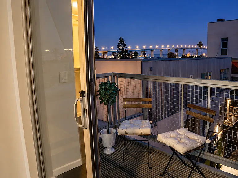 L2 - Primary bedroom private balcony with views of Coronado Bridge