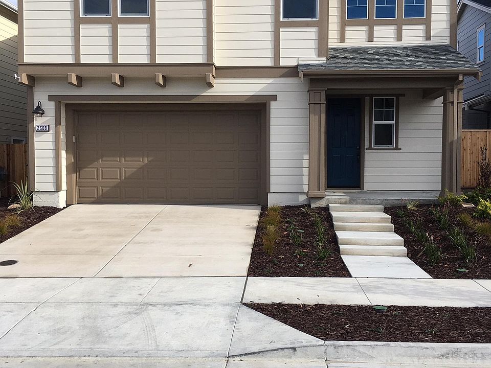 Street view. HOA maintained front yard. Two car garage with automatic door opener.