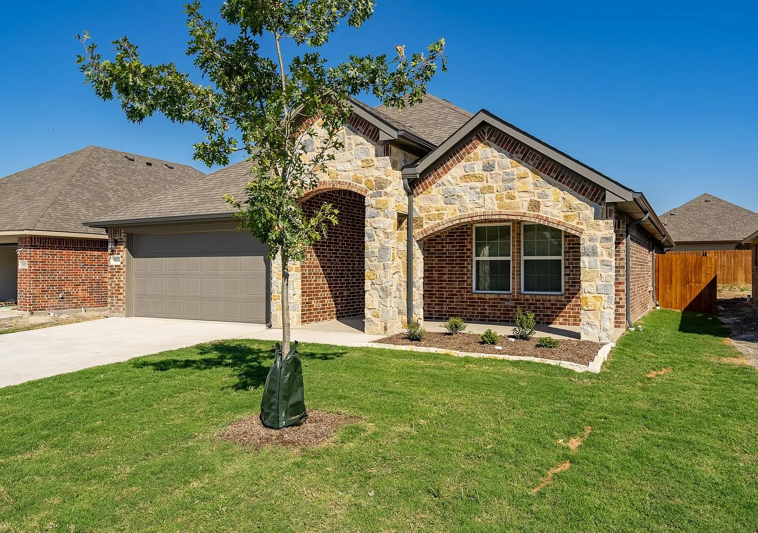 Modern Open-Concept 3-Bedroom Home with Premium Upgrades & Private Suite — Photo 2