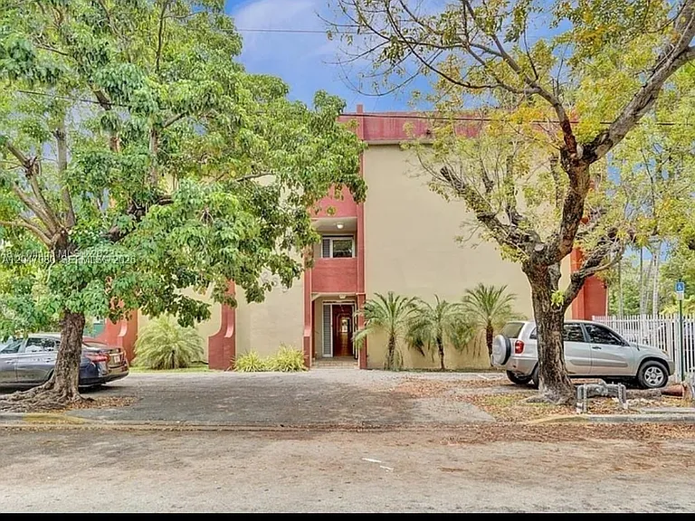 4265 NW South Tamiami Canal Dr #1-208 — Photo 1