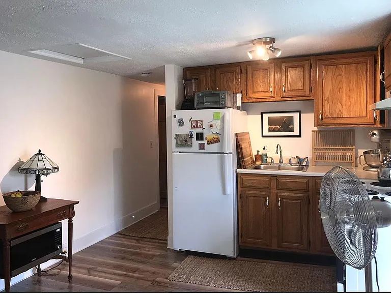Kitchen with refrigerator & stove