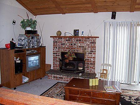 Living room with wood fireplace