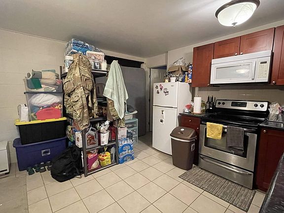 Bathroom behind the Refrigerator