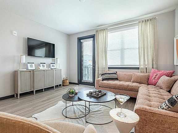 Step into elegance with this beautifully designed living room, where comfort meets style.