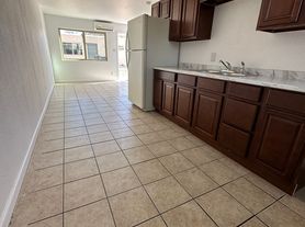 Spacious 2 Bedroom Apartment with Private Backyard