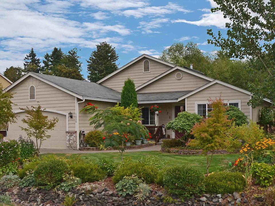 Front of home, beautifully landscaped