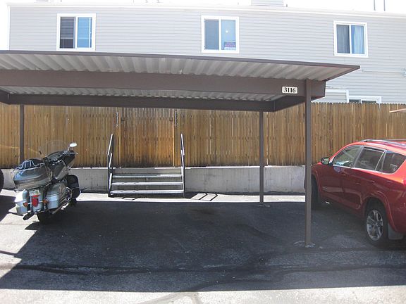 Carport for one car and lots of additional parking