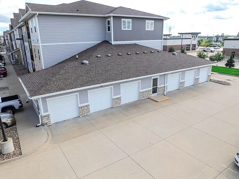 A number of garages are attached to 11Fifty on Olson's residential buildings