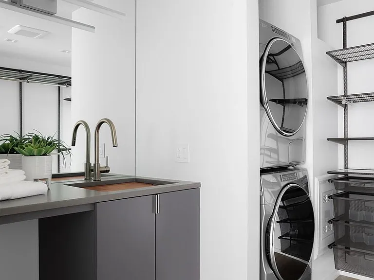 Master closet with laundry and work sink/station