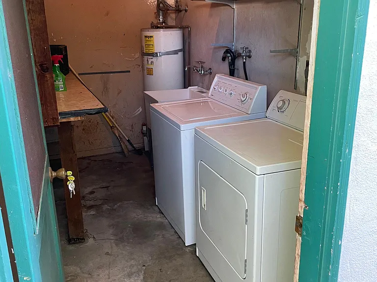 Dedicated laundry room accessible through back patio door. Only used by this unit.